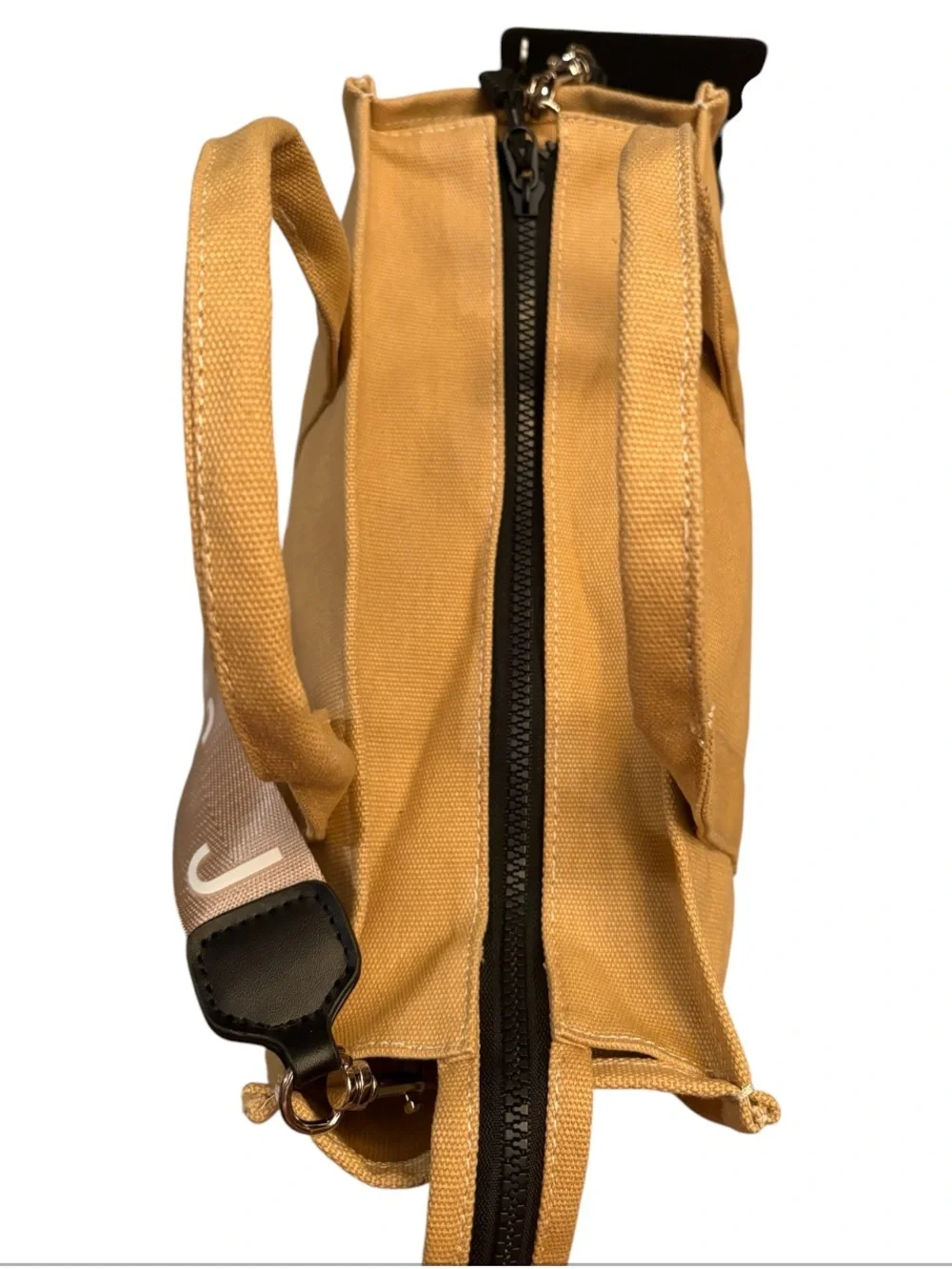 Marc Jacobs The Jacquard Tote Bag in the color Camel.